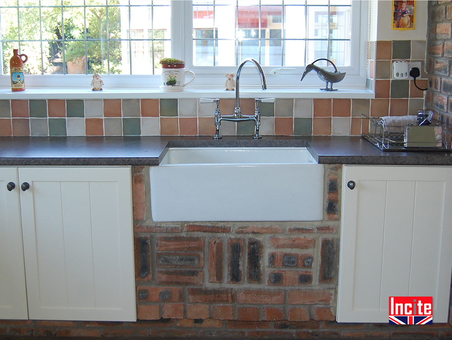Painted Fitted Kitchen With Tongue And Groove Door Detail